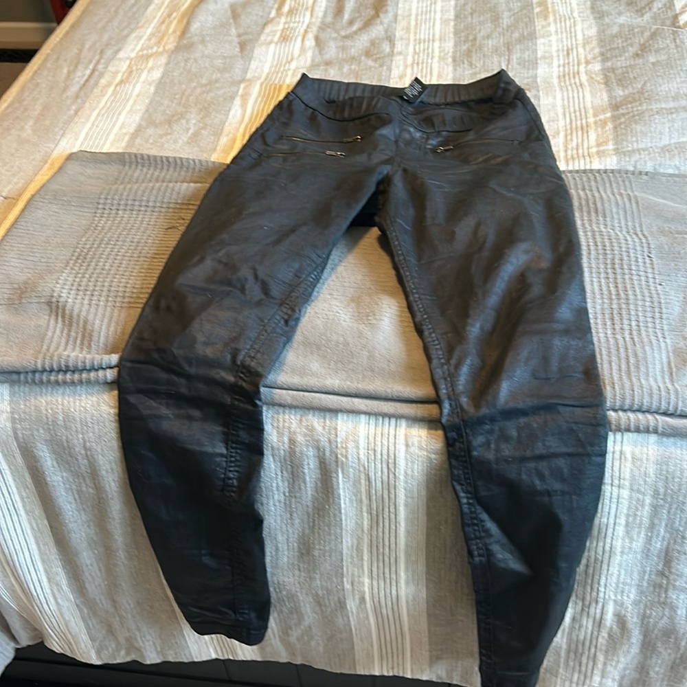 Hue pull on black coated Jegging